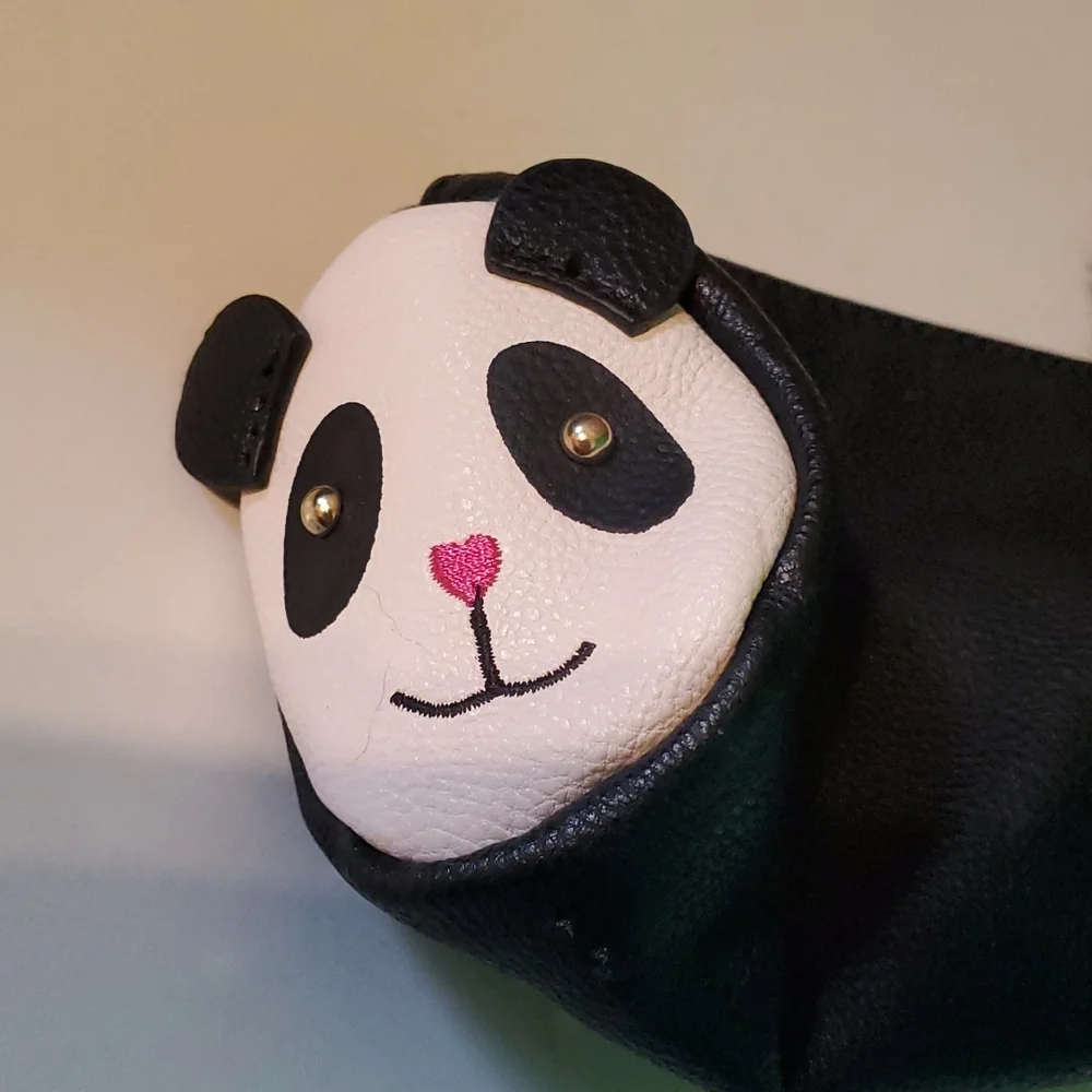 Betsey Johnson fux leatherpanda makeup case with pompom tail zipper